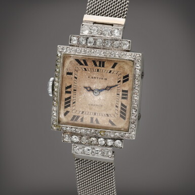View full screen - View 1 of Lot 465. A platinum and yellow gold diamond-set rectangular bracelet watch, Circa 1916.