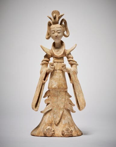 View full screen - View 1 of Lot 71. A Chinese Painted Pottery Figure of a Court Lady, Tang Dynasty | 唐 陶加彩仕女立俑.