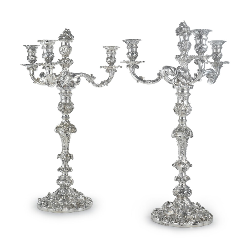 View full screen - View 1 of Lot 158. A Pair of George IV Silver Large Three- or Four-Light Candelabra, bases by Joseph Craddock, branches by R. & S. Garrard, London, 1825-6.