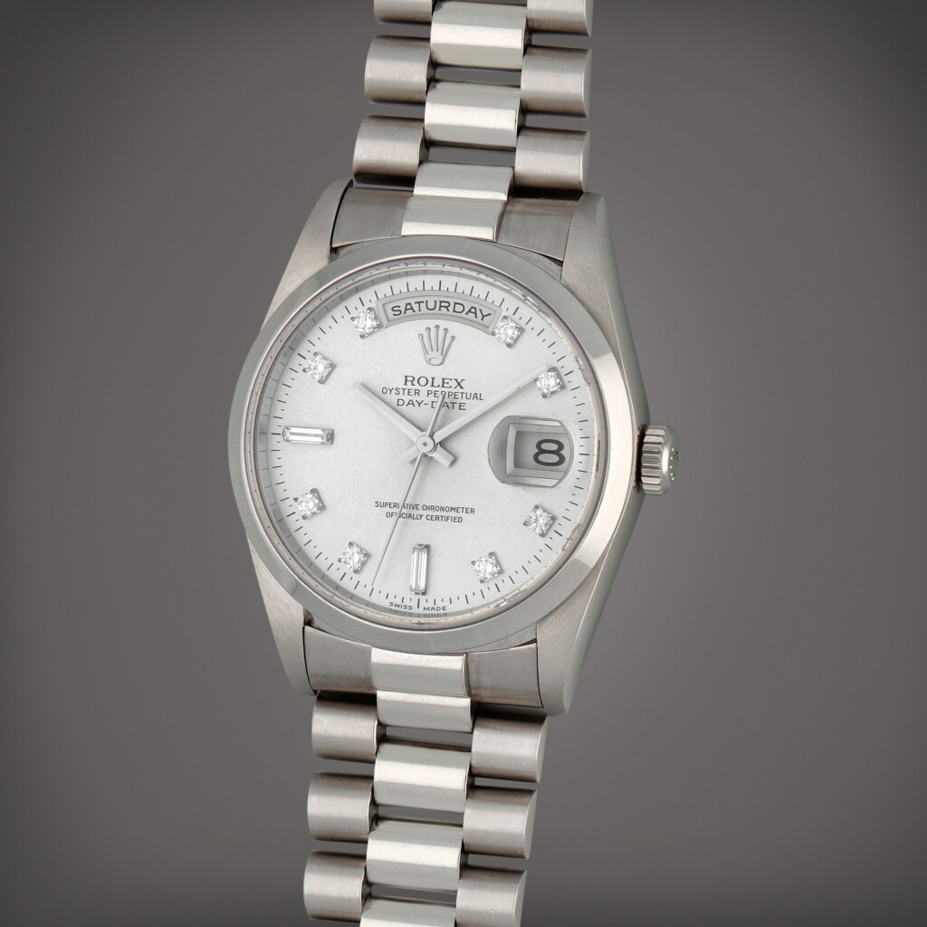 View full screen - View 1 of Lot 212. Day-Date, Reference 18206 | A platinum and diamond-set wristwatch with day, date and bracelet | Circa 1995.
