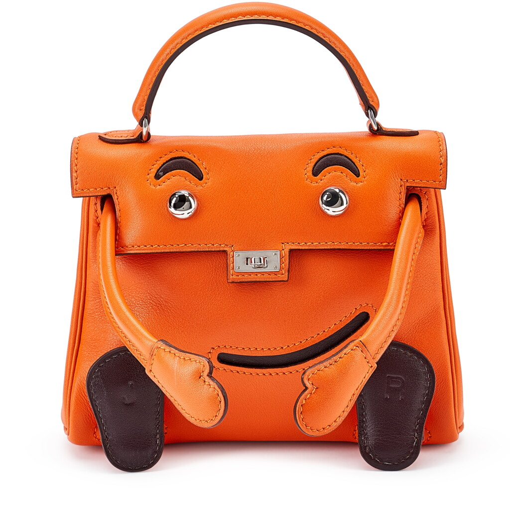 View full screen - View 1 of Lot 170. Limited Edition Orange H and Chocolat Gulliver Kelly Doll Quelle Idole Palladium Hardware, 2000.