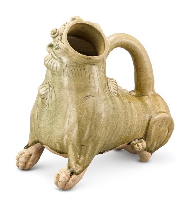 View full screen - View 1 of Lot 323. A RARE AND LARGE YUE CELADON 'TIGER' VESSEL, HUZI SOUTHERN DYNASTIES | 南朝 越窰青釉虎子.