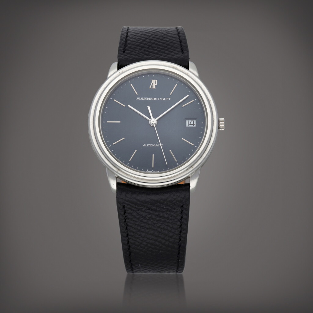 View full screen - View 1 of Lot 583. A platinum wristwatch with date | Circa 1993.
