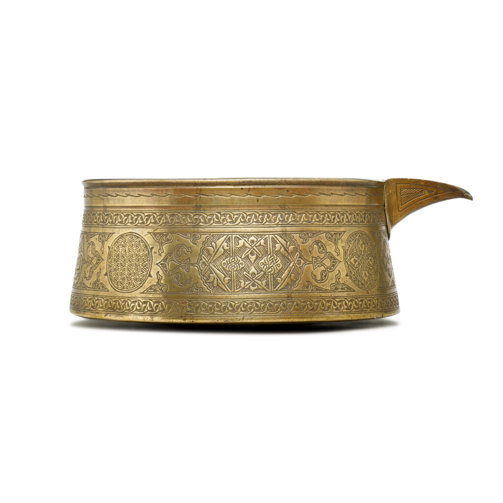 View full screen - View 1 of Lot 199. A Mamluk brass pouring vessel, probably Egypt, 15th/16th century.