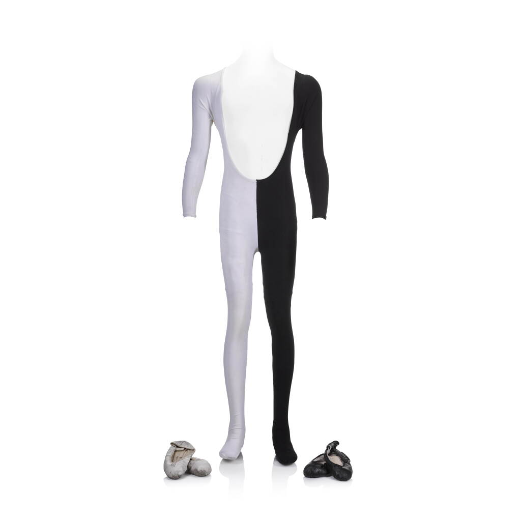 View full screen - View 1 of Lot 50. Freddie Mercury's catsuit worn on the video for 'We Are The Champions', 1977, with ballet shoes.