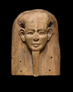 An Egyptian Wood Mummy Mask, 26th/30th Dynasty, 664-342 B.C.