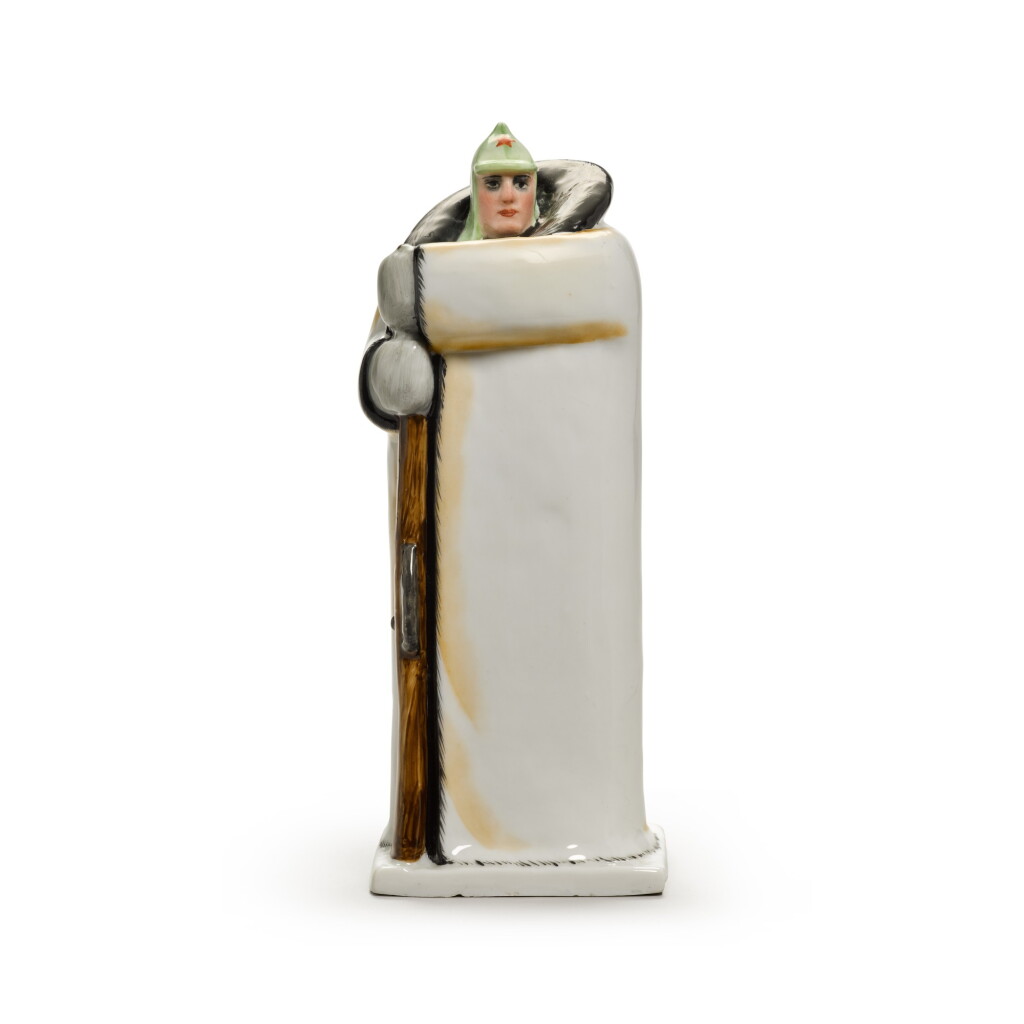 View full screen - View 1 of Lot 581. A Red Army soldier keeping watch: a Soviet porcelain figure, after a design by Ovnanovich, Lomonosov Porcelain Factory, Leningrad, 1930.