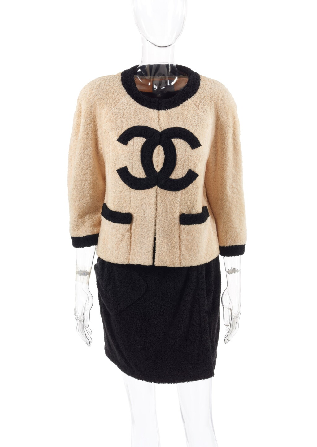 View full screen - View 1 of Lot 12. CHANEL | TERRY CLOTH JACKET AND SKIRT .