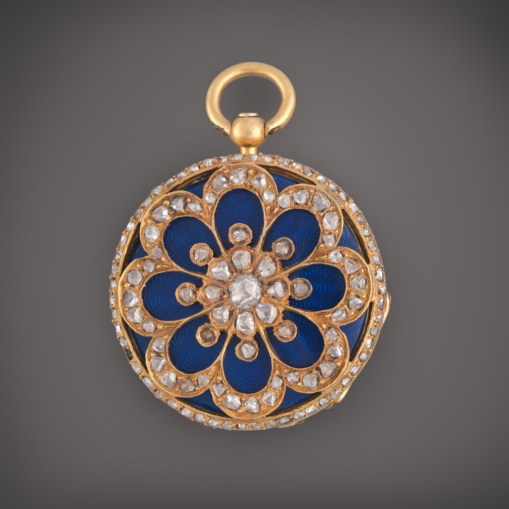 View full screen - View 1 of Lot 499. A miniature yellow gold, enamel, and diamond-set open faced watch with enamel dial, Circa 1850.