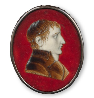 View full screen - View 1 of Lot 103. A French oval miniature on ivory representing Napoléon Bonaparte in profile on a red background, attributed to Degassli, Paris, circa 1800 | Miniature ovale sur ivoire représentant Napoléon Bonaparte de profil sur fond rouge, attribuée à Degassli, Paris, vers 1800.