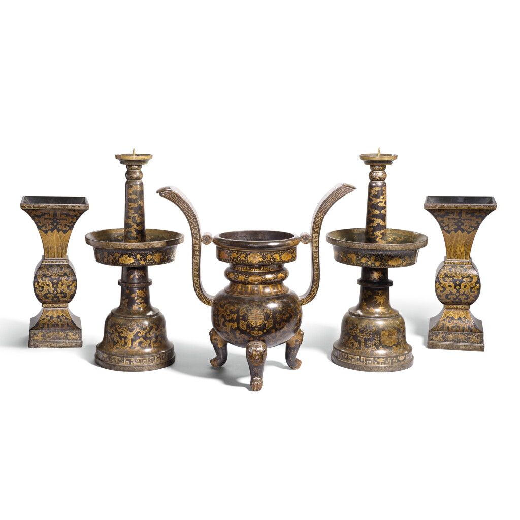 View full screen - View 1 of Lot 79. A LACQUERED AND GILT-DECORATED WOOD FIVE-PIECE ALTAR GARNITURE, LATE QING DYNASTY | 晚清 黑漆描金纏枝番蓮拐子龍紋五供一套.