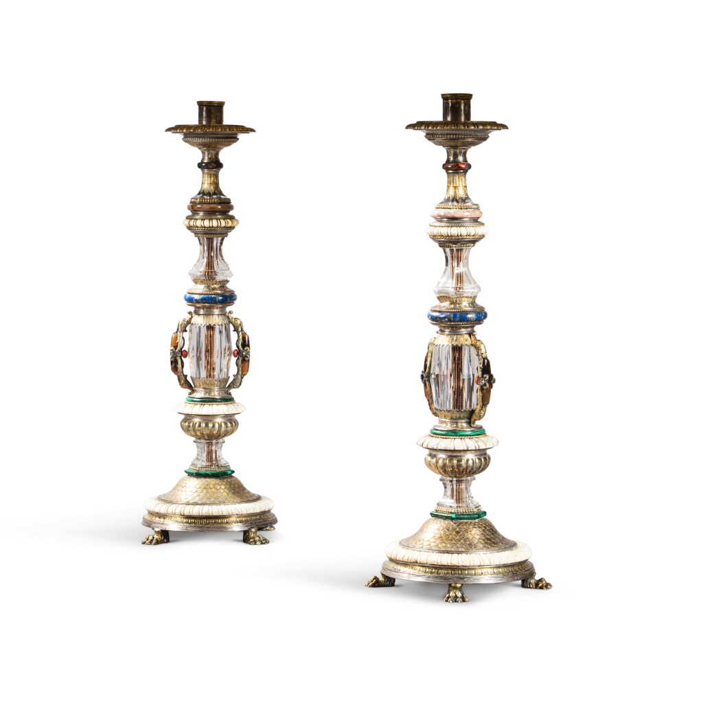 View full screen - View 1 of Lot 70. A pair of Italian Renaissance style rock-crystal, mammoth ivory, agate, lapis, red coral, malachite and silver-gilt candlesticks by Girolamo Giannetti, Spoleto, circa 1820.