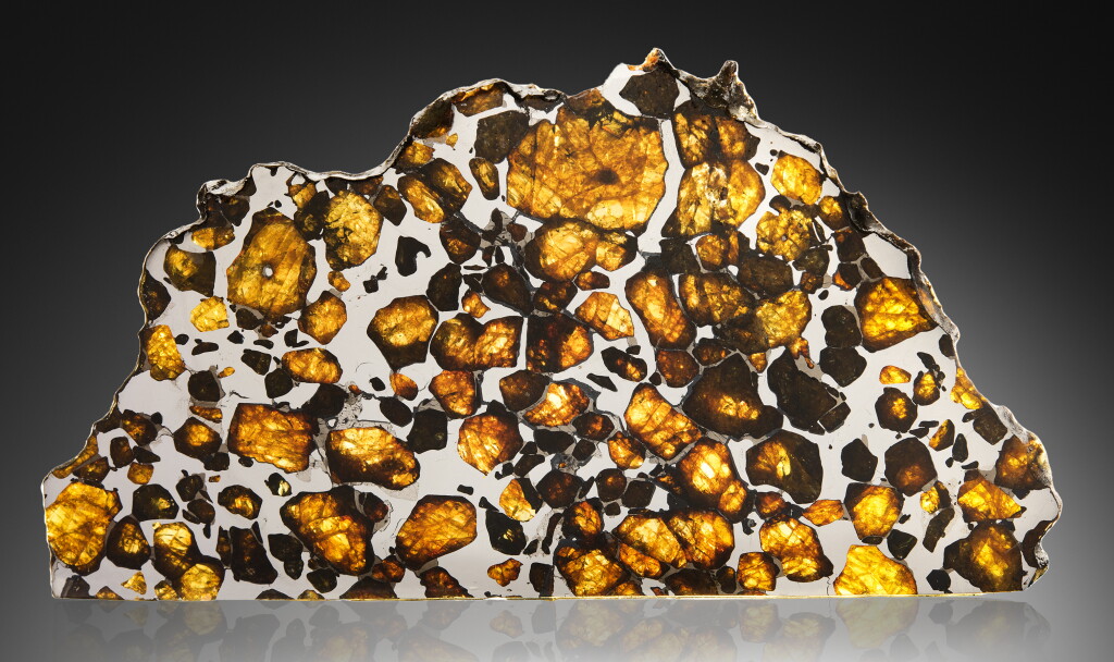 View full screen - View 1 of Lot 98. Imilac Meteorite | From The Highest Desert On Earth — Partial Slice Of An Imilac Pallasite With Peridot.
