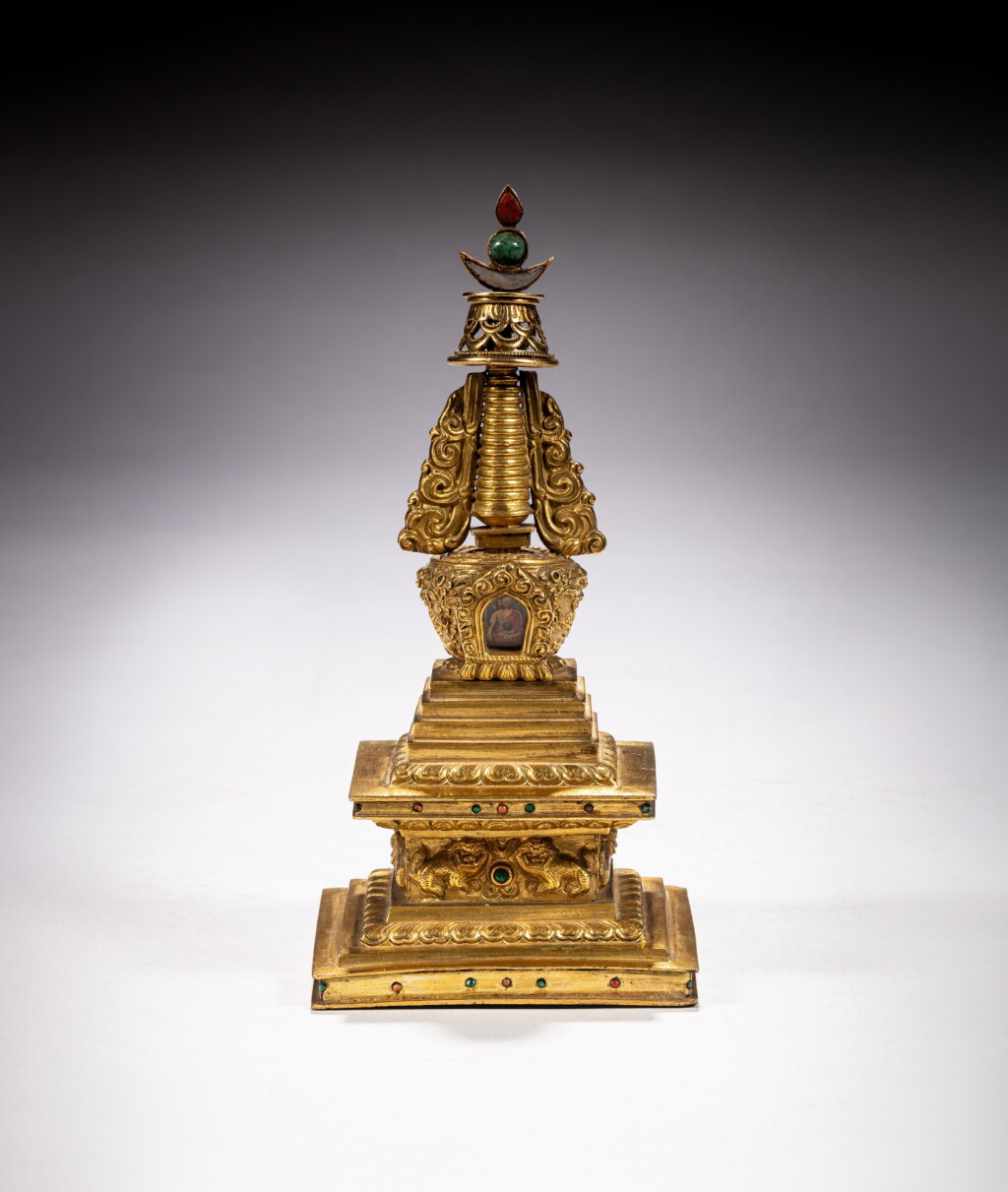 View full screen - View 1 of Lot 167. A gilt-copper stupa, Qing dynasty, 18th century | 清十八世紀 鎏金銅佛塔.