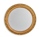A Continental carved giltwood circular mirror, 19th century