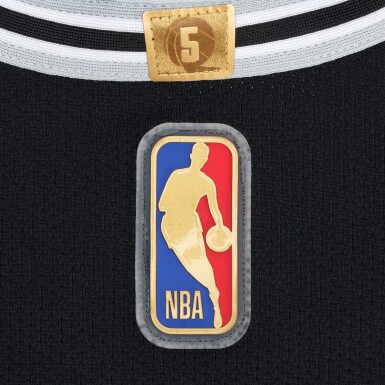 View full screen - View 1 of Lot 8. Stephon Castle San Antonio Spurs 2025-2026 NBA Tip-Off Game Worn Icon Edition Jersey | Special Edition 'Rookie of the Year' Trophy Patch | Gold NBA Logoman.