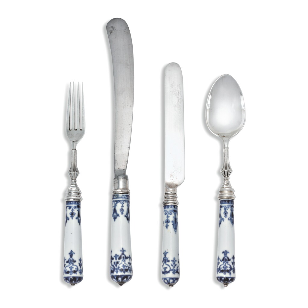 View full screen - View 1 of Lot 462. A CASED ASSEMBLED SET OF ST. CLOUD AND FRENCH BLUE AND WHITE PORCELAIN SILVER AND STEEL-MOUNTED CUTLERY, CIRCA 1740.