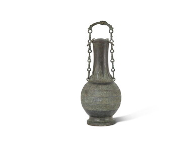 View full screen - View 1 of Lot 5035. An archaic bronze ritual wine vessel and cover, hu Warring States period 戰國 青銅提樑壺.