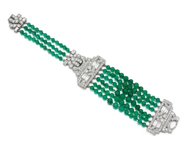 View full screen - View 1 of Lot 16. EMERALD AND DIAMOND BRACELET, 1930S.