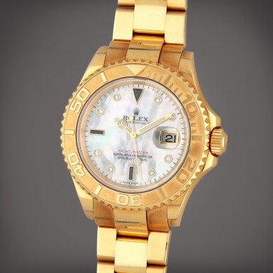 View full screen - View 1 of Lot 181. Yacht-Master, Reference 16628B | A yellow gold, diamond and sapphire-set wristwatch with date, mother-of-pearl dial and bracelet | Circa 2006.