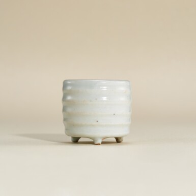 View full screen - View 1 of Lot 5750. A small blanc-de-Chine tripod incense burner, Ming dynasty | 明 德化白釉弦紋筒式琴爐.