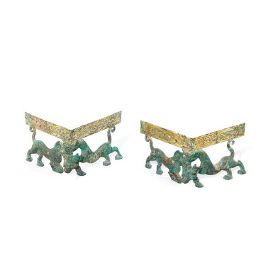 View full screen - View 1 of Lot 3021. Two gilt-bronze 'tiger and ram' corner brackets, Western Han dynasty | 西漢 青銅鎏金虎噬羊紋飾一對.