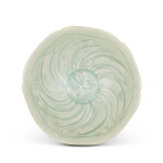 A carved Qingbai 'floral' bowl, Northern Song dynasty | 北宋 青白釉葵花盌