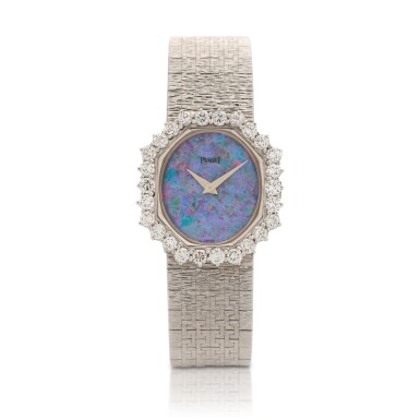 View full screen - View 1 of Lot 210. Ref. 93416 A6 White gold and diamond-set bracelet watch with opal dial Circa 1975.