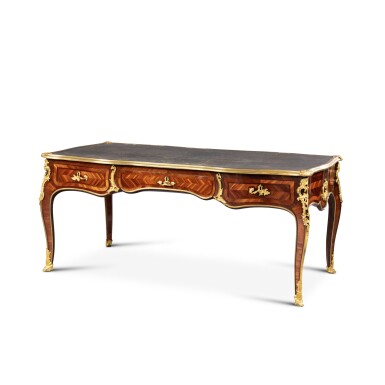 View full screen - View 1 of Lot 352. A partly Louis XV gilt-bronze mounted, satiné and amaranth venereed desk, stamped by Jacques Dubois | Bureau plat en placage de satiné et amarante, bronze doré en partie d'époque Louis XV, estampillé Jacques Dubois.