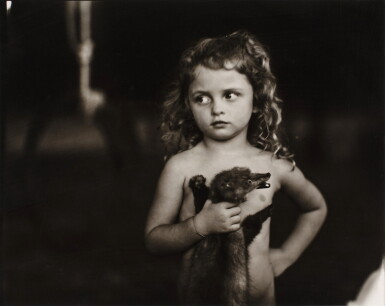 View full screen - View 1 of Lot 913. Holding the Weasel.