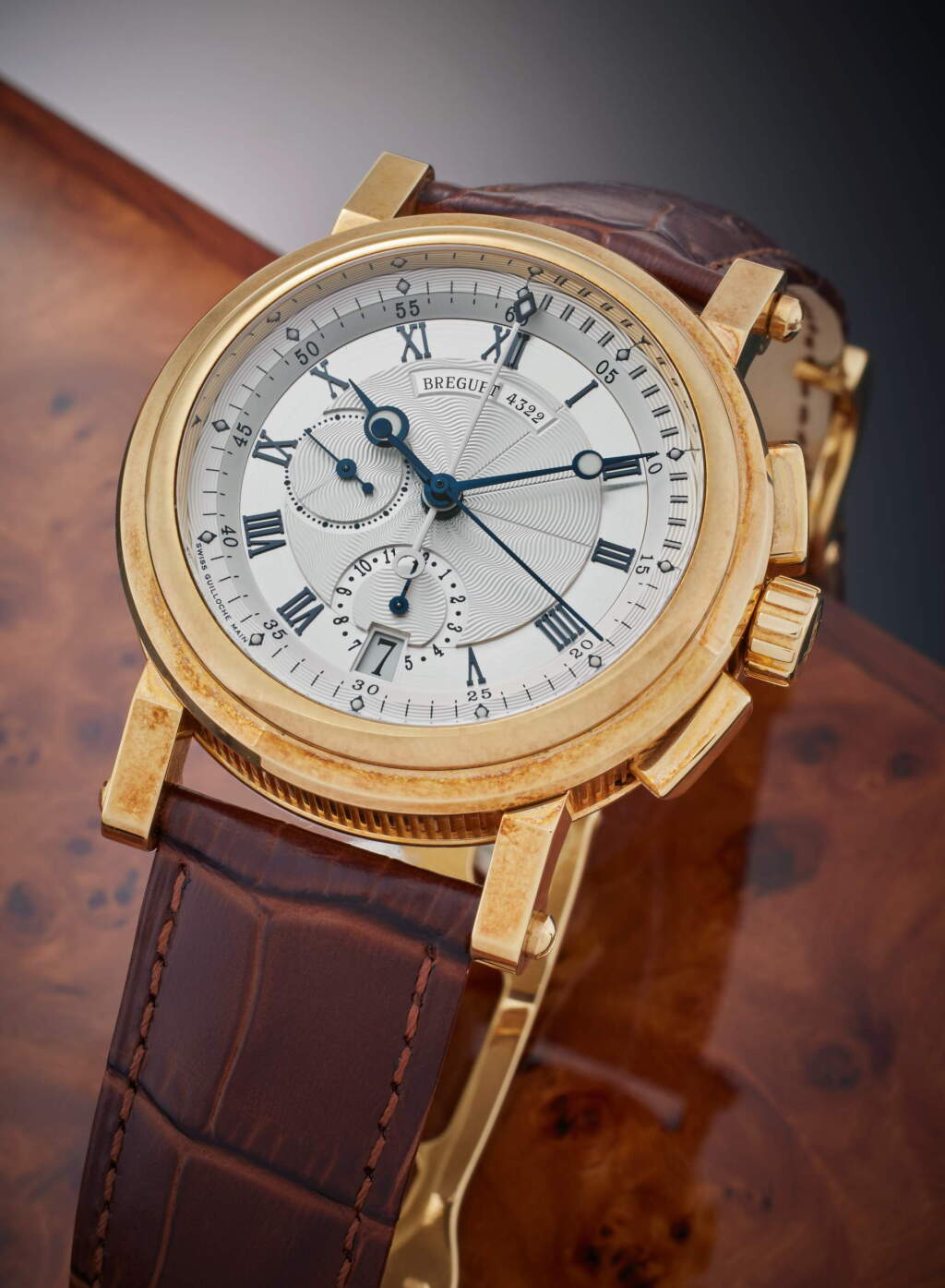 View full screen - View 1 of Lot 78. Reference 5827BA/12/9Z8 Horloger de la Marine | A yellow gold automatic flyback chronograph wristwatch with date, Circa 2006.