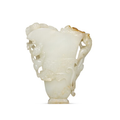 View full screen - View 1 of Lot 44. An archaistic white jade libation cup, Qing dynasty, 18th century | 清十八世紀 白玉仿古螭龍紋盃.