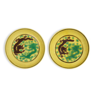 View full screen - View 1 of Lot 903. A pair of yellow-ground green and aubergine-enameled 'dragon' dishes, Marks and period of Guangxu | 清光緒 黃地紫綠彩雲龍紋盤一對 《大清光緒年製》款.