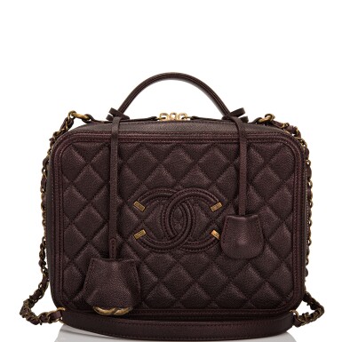 View full screen - View 1 of Lot 177. Chanel Iridescent Burgundy Large Filigree Vanity Case of Caviar Leather with Matte Gold Tone Hardware.