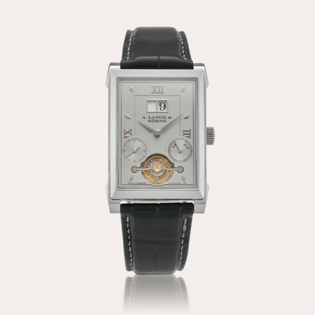 View full screen - View 1 of Lot 117. Reference 703.025F Cabaret Tourbillon | A platinum rectangular semi-skeletonized tourbillon wristwatch with digital date display and power reserve indication, Circa 2010.
