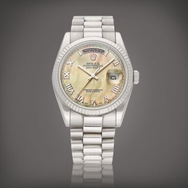 View full screen - View 1 of Lot 2263. Day-Date, Reference 118239 | A white gold wristwatch with day, date, mother-of-pearl dial and bracelet, Circa 2000 | 勞力士 | Day-Date 型號118239 | 白金鏈帶腕錶,備日期、星期顯示及珠母貝錶盤,約2000年製.
