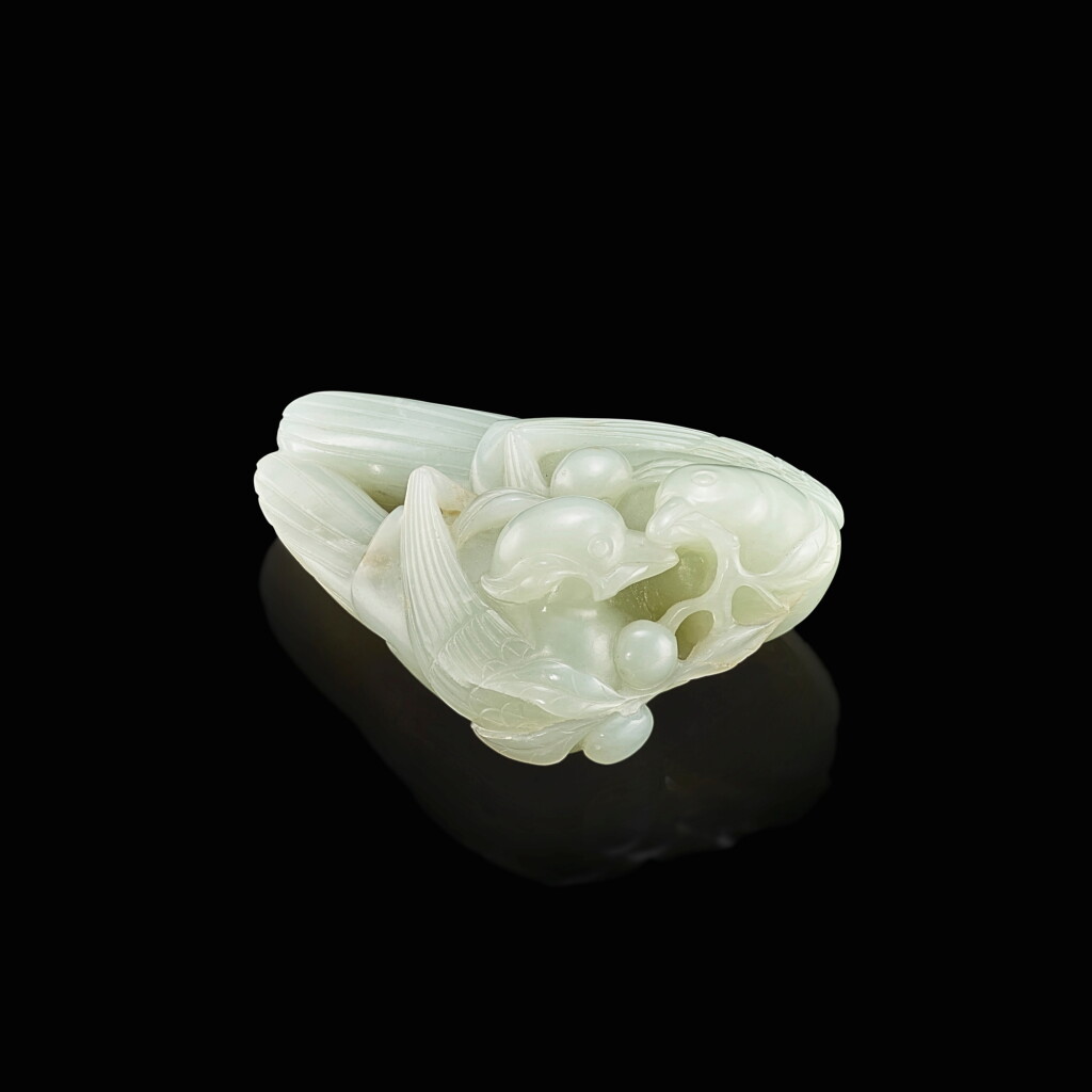 View full screen - View 1 of Lot 3007. A celadon jade 'magpies and longan' group, Qing dynasty, 18th century 清十八世紀 青白玉喜报三元把件.
