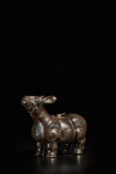 View full screen - View 1 of Lot 215. An archaistic gold and silver-inlaid bronze tapir-form vessel (Zun), Ming dynasty.