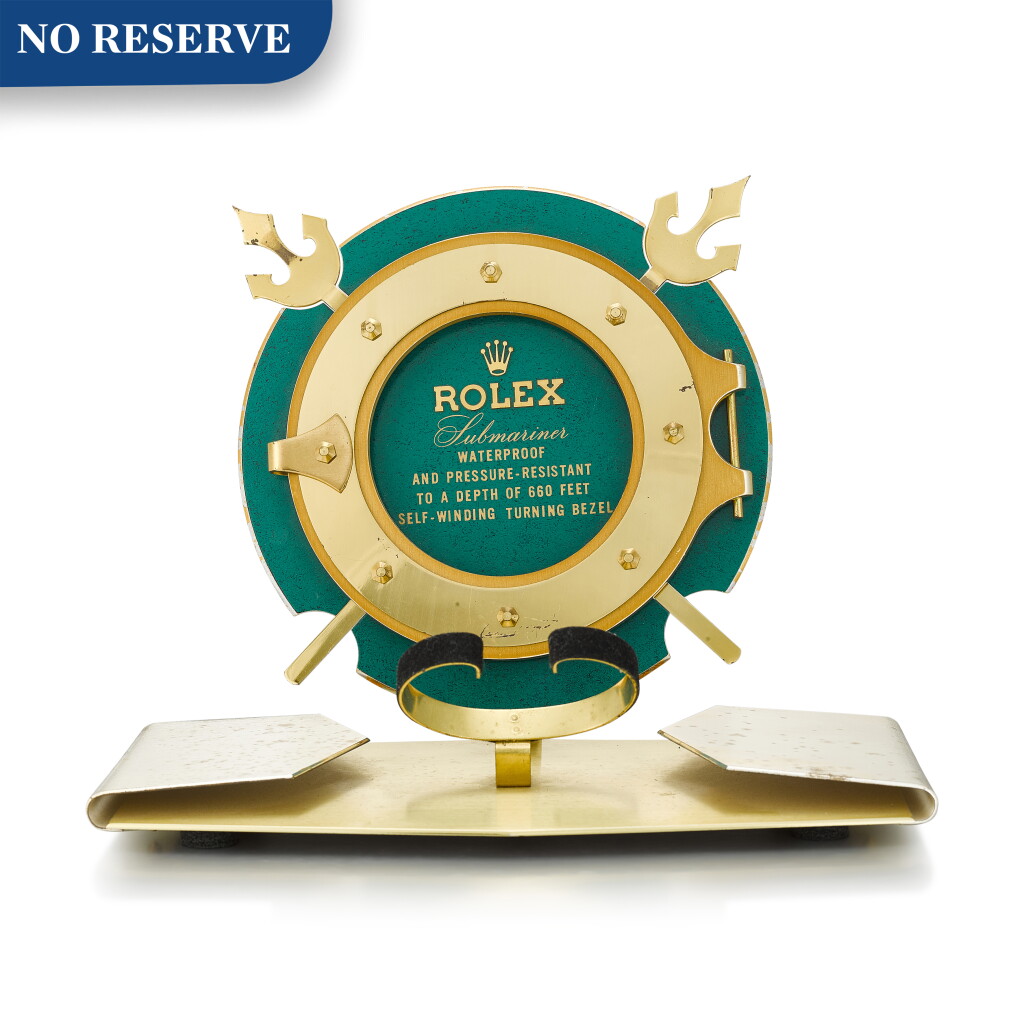 View full screen - View 1 of Lot 8006. ROLEX | SUBMARINER A GILT BRASS AND GREEN ENAMEL RETAILER'S WINDOW DISPLAY, CIRCA 1960.