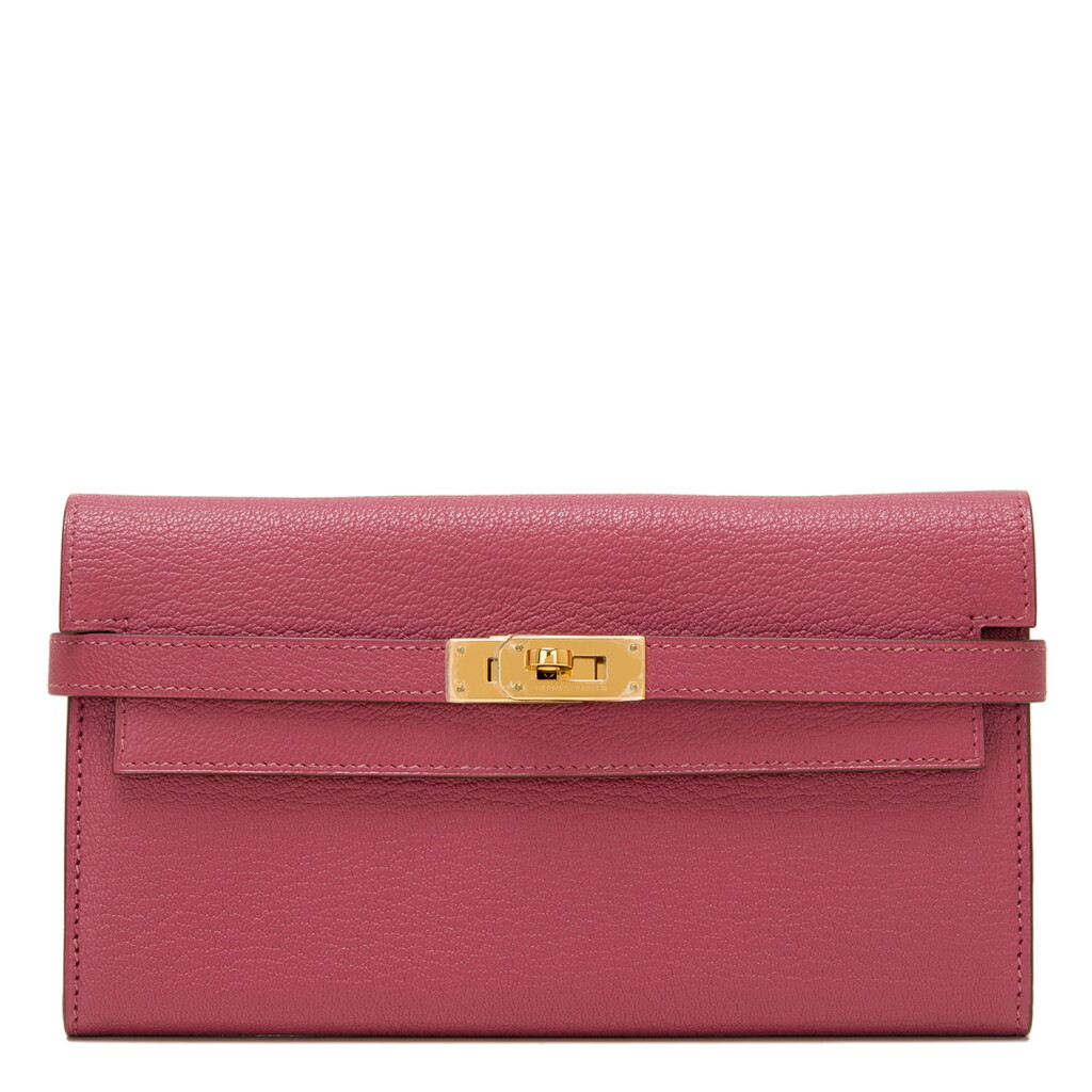View full screen - View 1 of Lot 167. Hermès Bois de Rose Kelly Long Wallet of Chevre Leather with Gold Hardware.