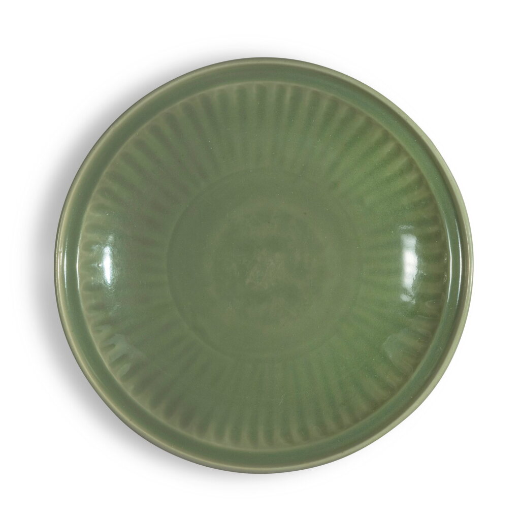 View full screen - View 1 of Lot 230. A large 'Longquan' celadon-glazed dish, Early Ming dynasty | 明初 龍泉窰青釉印花大盤.
