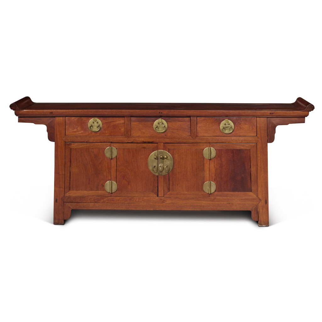 View full screen - View 1 of Lot 75. A 'huanghuali' three-drawer altar coffer (Liansanchu), Late Qing dynasty | 清末 黃花梨聯三櫥.