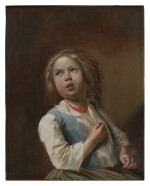 Portrait of a young girl wearing a coral necklace