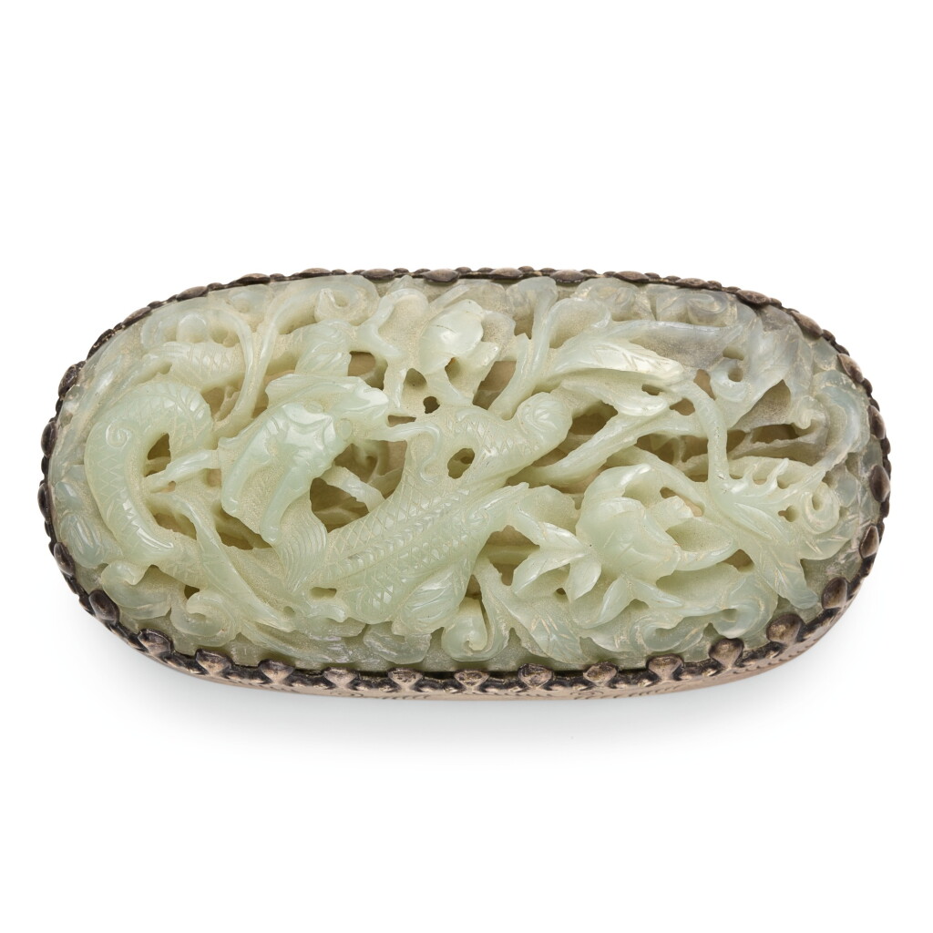 View full screen - View 1 of Lot 69. A RETICULATED CELADON JADE PLAQUE, YUAN/MING DYNASTY | 元/明 青玉鏤雕穿花雲龍紋牌飾.