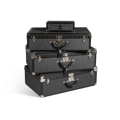 View full screen - View 1 of Lot 135. Set of Four: Damier Graphite Canvas Trunks and Watch Trunk, 21st Century.