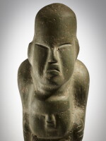 Olmec Stone Figure Holding an Effigy Head, Guerrero region, Middle to Late Preclassic, 900 - 300 BC