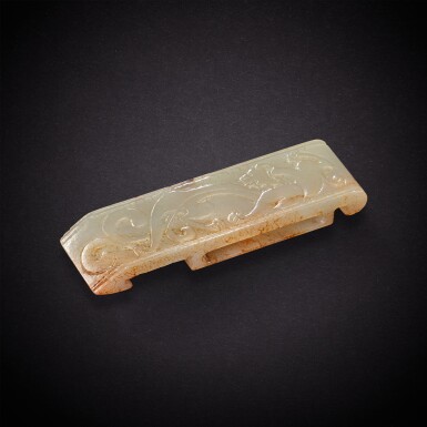 View full screen - View 1 of Lot 3513. A pale celadon jade 'chilong' scabbard slide, Eastern Han dynasty | 東漢 青白玉螭龍紋劍璏.