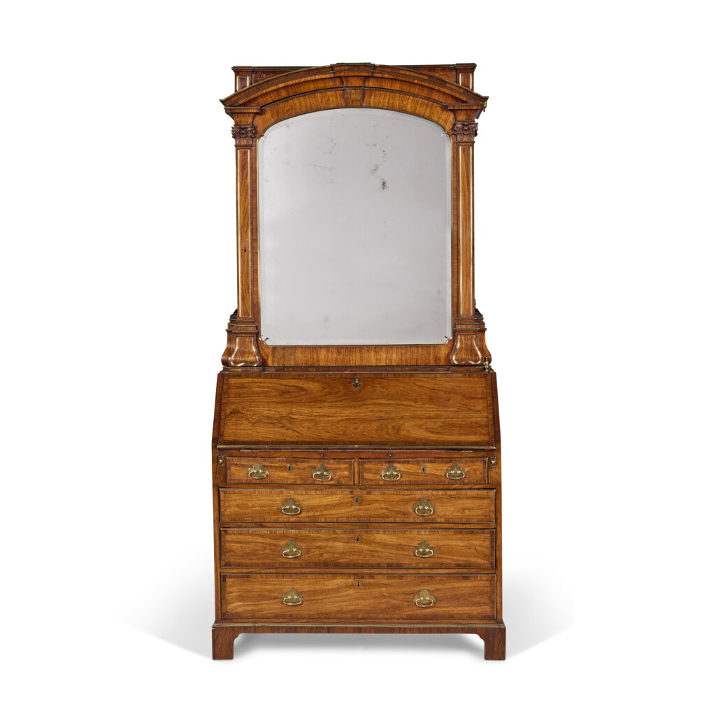 View full screen - View 1 of Lot 37. A George II Brass-Mounted and Inlaid Padouk Bureau Cabinet in the Manner of John Channon, Circa 1735.