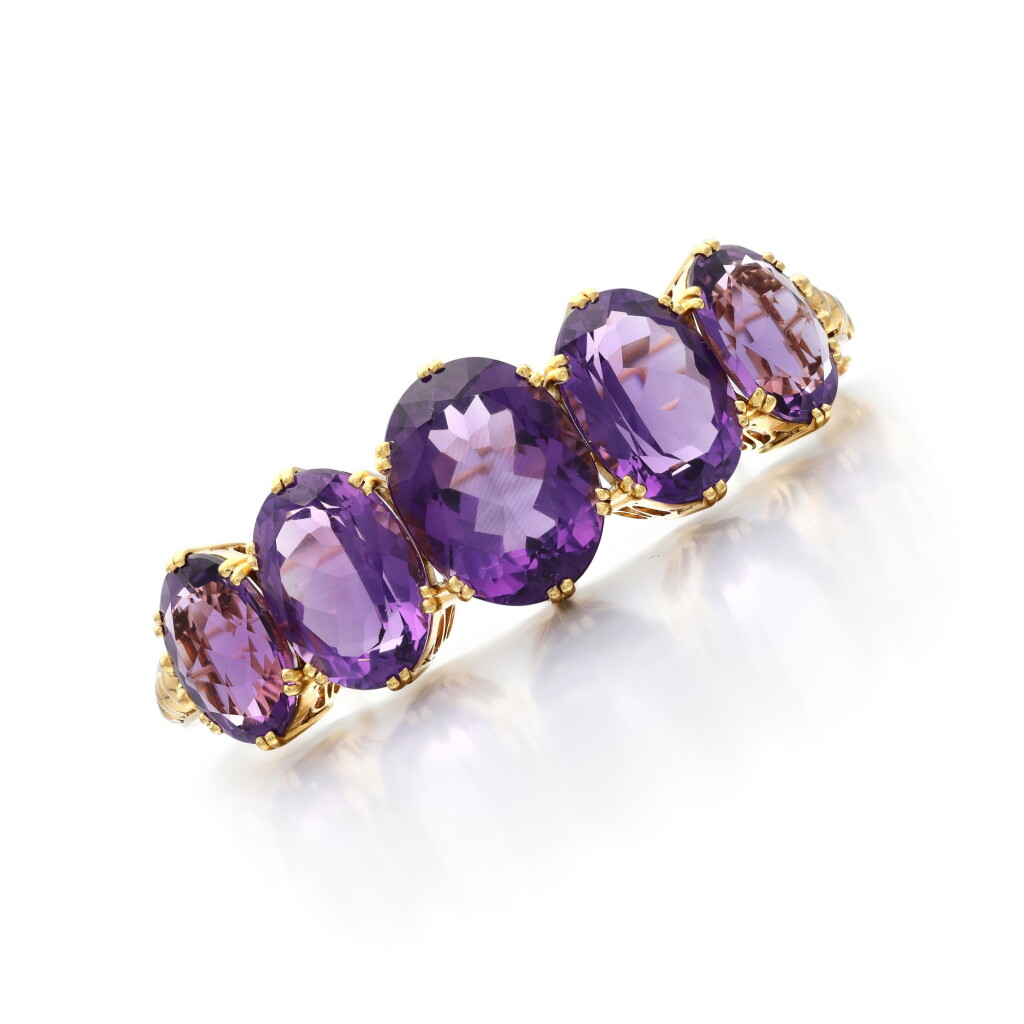 View full screen - View 1 of Lot 186. An amethyst bangle, late 19th century .