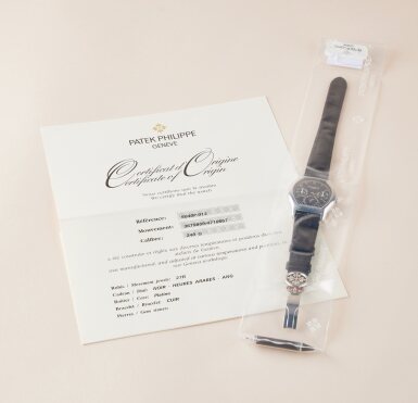 View full screen - View 1 of Lot 2353. Reference 5040 | A platinum perpetual calendar wristwatch with moon phases, 24 hour and leap year indication, in single factory seal, Circa 2009.